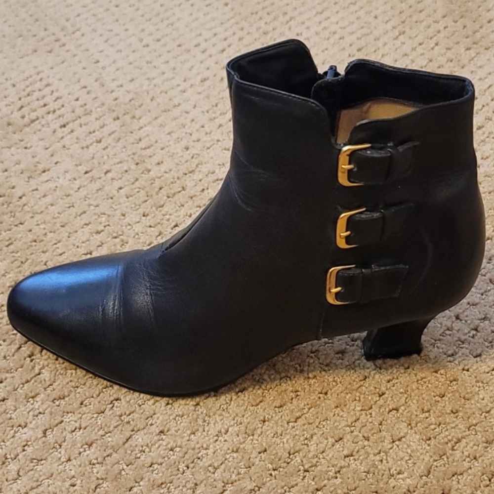 Enzo Angiolini black shoe boot with gold buckles on the side. Size 10.
